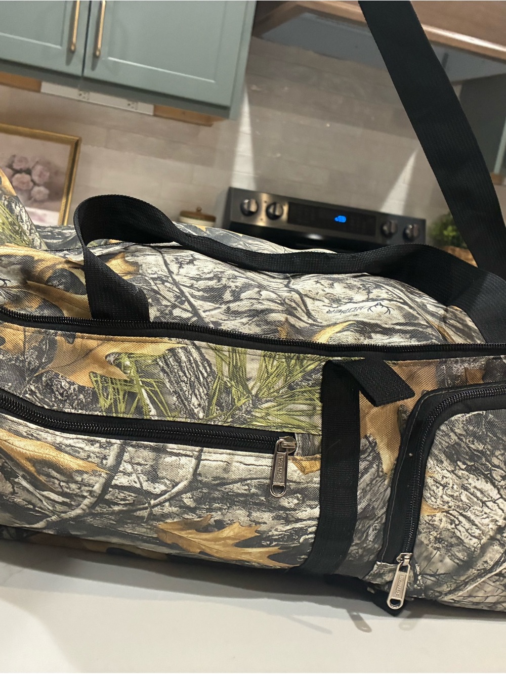 10 pocket Camouflage Duffel Bag with Black Straps, liquid & shoe, compartments
